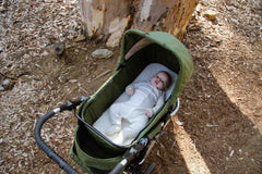 Organic Cotton Bassinet Sheet on Bumbleride Indie All Terrain in Camp Green